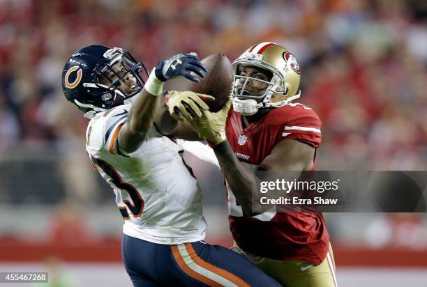 Cornerback Kyle Fuller of the Chicago Bears intercepts a pass intended for wide receiver Michael Crabtree of the San Francisco 49ers at Levi's...