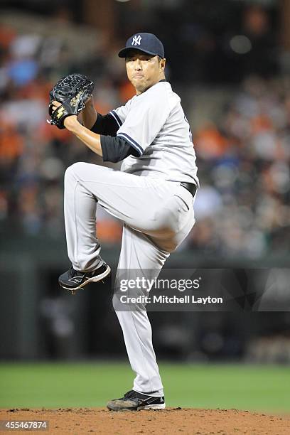 Hiroki Kuroda of the New York Yankees pitches in first inning during a baseball game against the Baltimore Orioles on September 14, 2014 at Oriole...