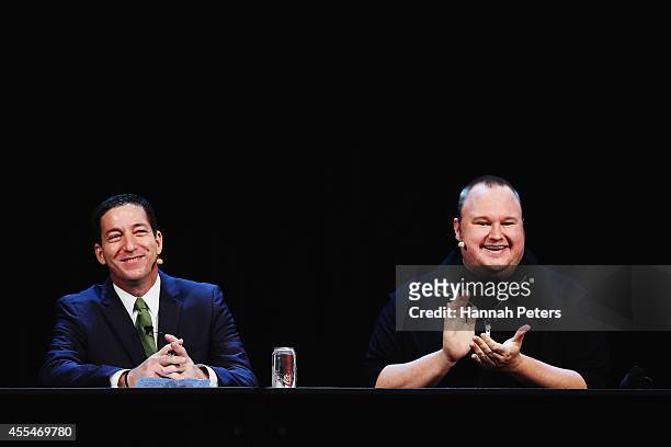 Glenn Greenwald and Kim Dotcom discuss the revelations about New Zealand's mass surveillance at Auckland Town Hall on September 15, 2014 in Auckland,...
