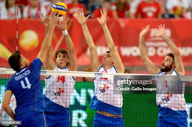 Serbia players in action during Round 2 of the FIVB Volleyball Mens World Championship match between Serbia and France at Atlas Arena on September...