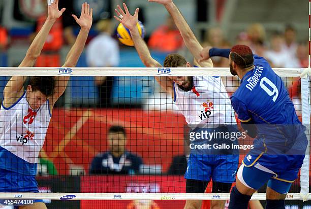 Serbia players in action during Round 2 of the FIVB Volleyball Mens World Championship match between Serbia and France at Atlas Arena on September...