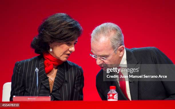 Santander's new chairwoman Ana Patricia Botin speaks with Banco Santander's General Secretary Ignacio Benjumea during an Extraordinary General...