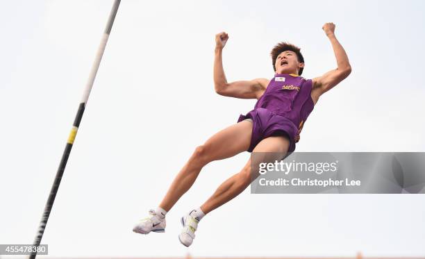 Changrui Xue of China celebrates as he clears a jump in the Mens Pole Vault during the IAAF Continental Cup Day 2 at the Stade de Marrakech on...