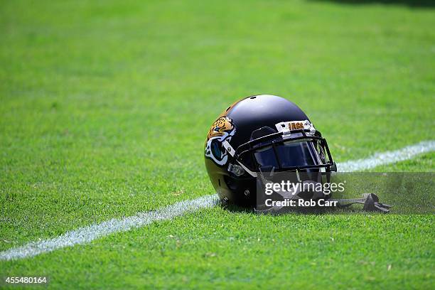 Jacksonville Jaguars helmet sits on the field before the start of the Jaguars and Washington Redskins game at FedExField on September 14, 2014 in...