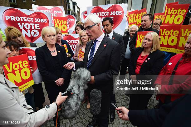 Alistair Darling leader of the Better Together joine by Alistair Darling,Johann Lamont, Anas Sarwar and Margaret Curran meets with members of the...
