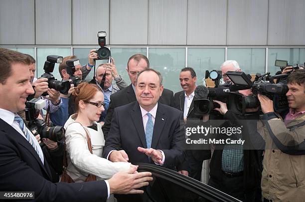 First Minister Alex Salmond leaves Edinburgh International Airport following a photocall in the arrival's hall on September 15, 2014 in Edinburgh,...