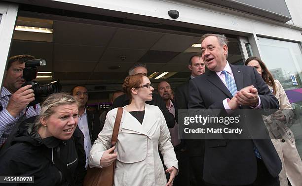 First Minister Alex Salmond leaves Edinburgh International Airport following a photocall in the arrival's hall on September 15, 2014 in Edinburgh,...