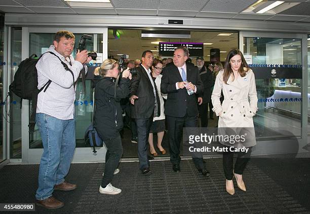First Minister Alex Salmond leaves Edinburgh International Airport following a photocall in the arrival's hall on September 15, 2014 in Edinburgh,...