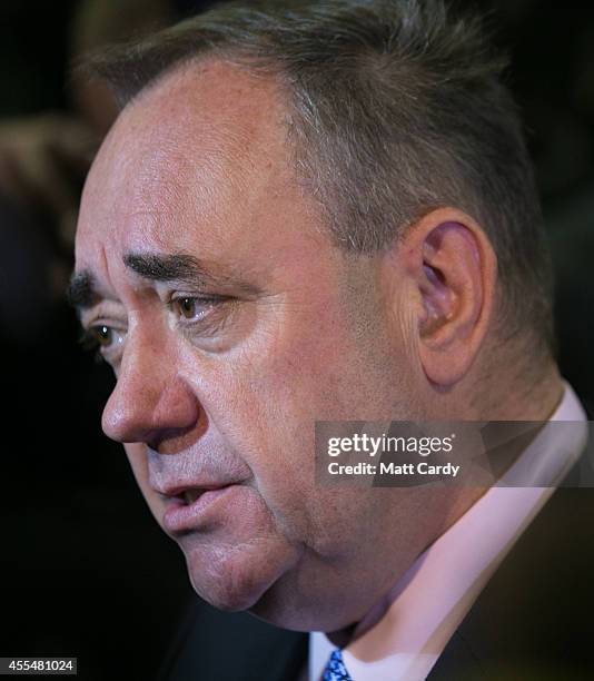 First Minister Alex Salmond speaks with the media at Edinburgh International Airport following a photocall in the arrival's hall on September 15,...