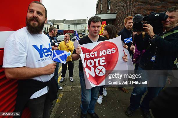 Yes and No supporters exchange words during, as Alistair Darling leader of the Better Together meets with members of the public during a walk about...
