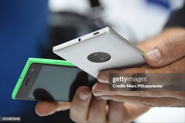 The Nokia Lumia 730 smartphones are presented at the Photokina 2014 trade fair on September 15, 2014 in Cologne, Germany. Photokina is the world's...