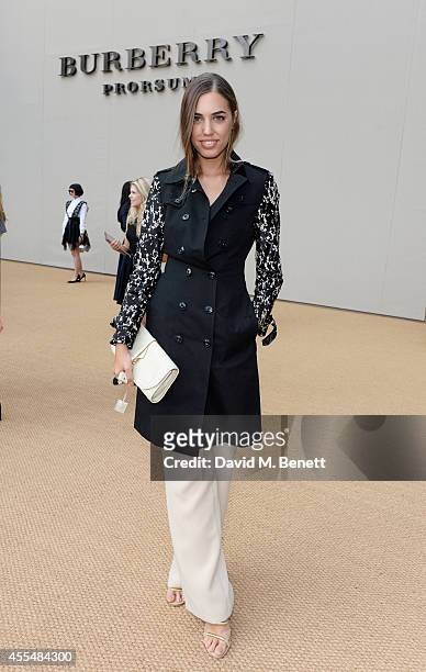 Amber Le Bon attends the Burberry Womenswear SS15 show during London Fashion week at Kensington Gardens on September 15, 2014 in London, England.