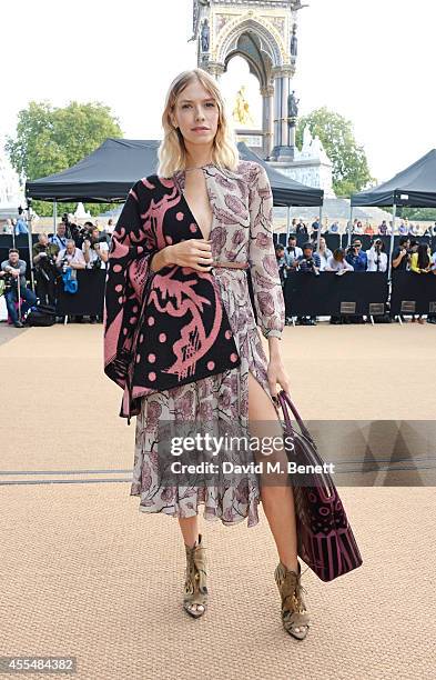 Elena Perminova attends the Burberry Womenswear SS15 show during London Fashion week at Kensington Gardens on September 15, 2014 in London, England.