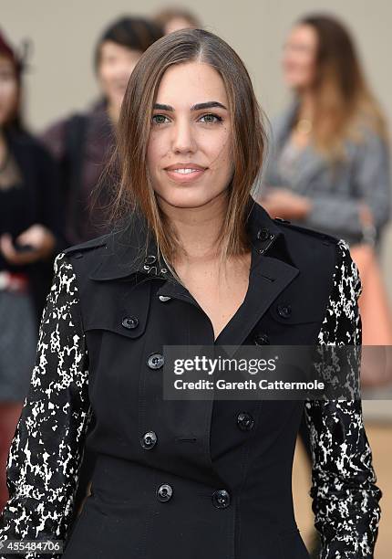 Amber Le Bon attends the Burberry Womenswear SS15 show during London Fashion Week at Kensington Gardens on September 15, 2014 in London, England.