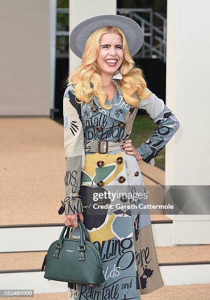 Paloma Faith attends the Burberry Womenswear SS15 show during London Fashion Week at Kensington Gardens on September 15, 2014 in London, England.