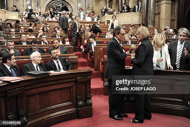 President of Catalonia's regional government and leader of the Catalan Convergence and Unity party Artur Mas speaks with the president of the...