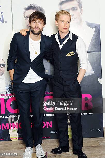 Freddie Fox and Douglas Booth attend a photocall for the film 'The Riot Club' at The BFI Southbank, London on September 15, 2014 in London, England.