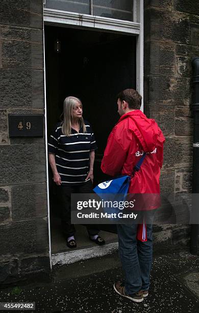 Volunteers from the Better Together campaign canvass in a residential street on September 15, 2014 in Edinburgh, Scotland. With the campaigning for...