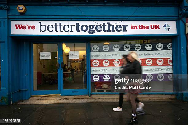 People pass the Better Together Edinburgh office on September 15, 2014 in Edinburgh, Scotland. With the campaigning for the independence referendum...