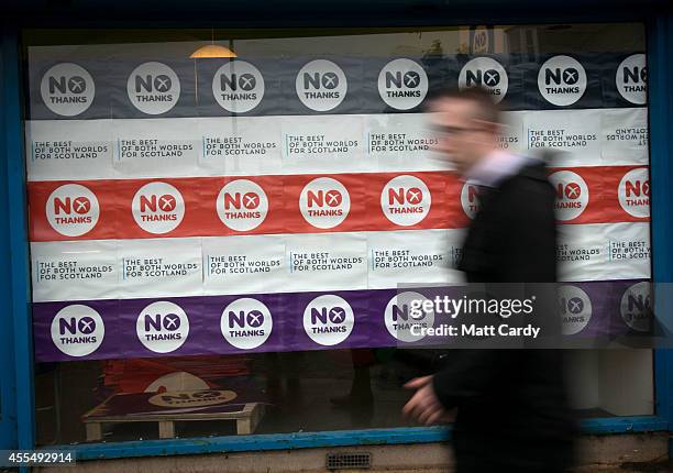 Man passes the Better Together Edinburgh office on September 15, 2014 in Edinburgh, Scotland. With the campaigning for the independence referendum...