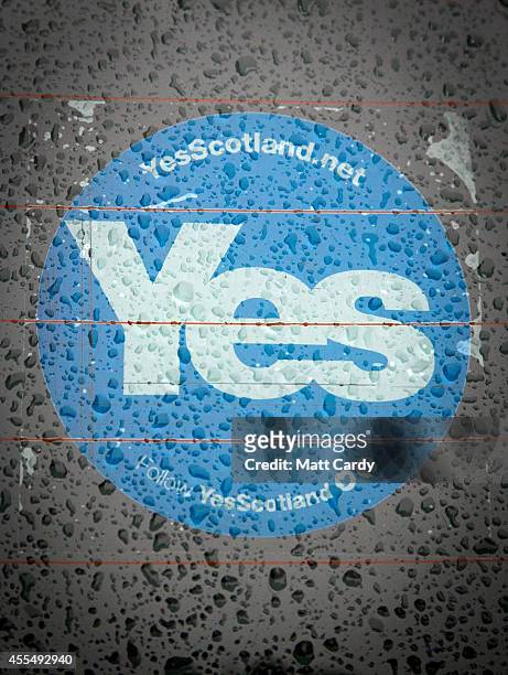 Rain drops collect on a Yes sticker displayed in the rear of a car window on September 15, 2014 in Edinburgh, Scotland. With the campaigning for the...