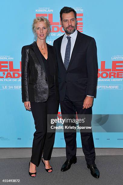 Sandrine Kiberlain and Laurent Lafitte attend the 'Elle l'adore' Paris Premiere at Cinema UGC Normandie on September 15, 2014 in Paris, France.