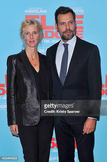 Sandrine Kiberlain and Laurent Lafitte attend the 'Elle l'adore' Paris Premiere at Cinema UGC Normandie on September 15, 2014 in Paris, France.
