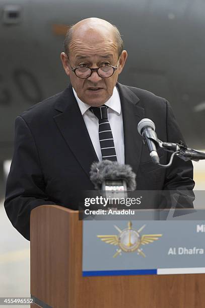 French Defense Minister Jean-Yves Le Drian makes his speech upon his visit to Al Dhafra Air Base in Abu Dhabi, United Arab Emirates on September 15,...