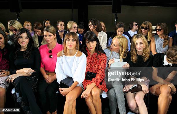 Daisy Lowe, Pixie Geldof and Alexa Chung attend the Christopher Kane show during London Fashion Week Spring Summer 2015 at on September 15, 2014 in...