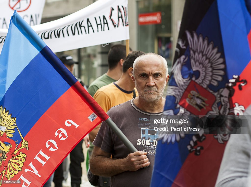 Bulgarian citizens rally in the streets in Sofia demanding...