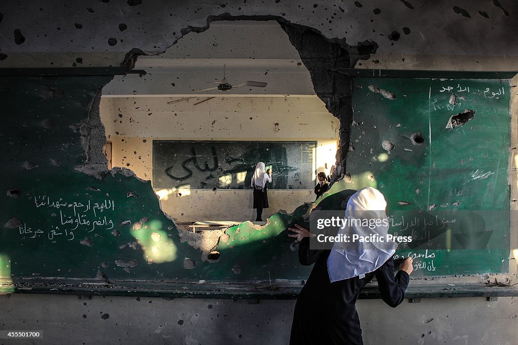 Palestinian students inside their school, on the second day...