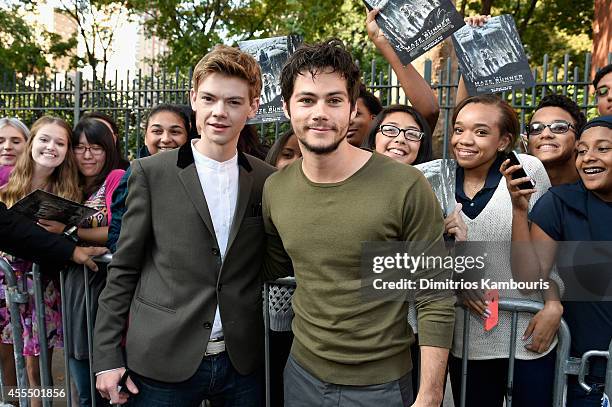 Actors Dylan O'Brien and Thomas Brodie-Sangster attend the "Maze Runner" New York City screening hosted by Twentieth Century Fox and Teen Vogue at...