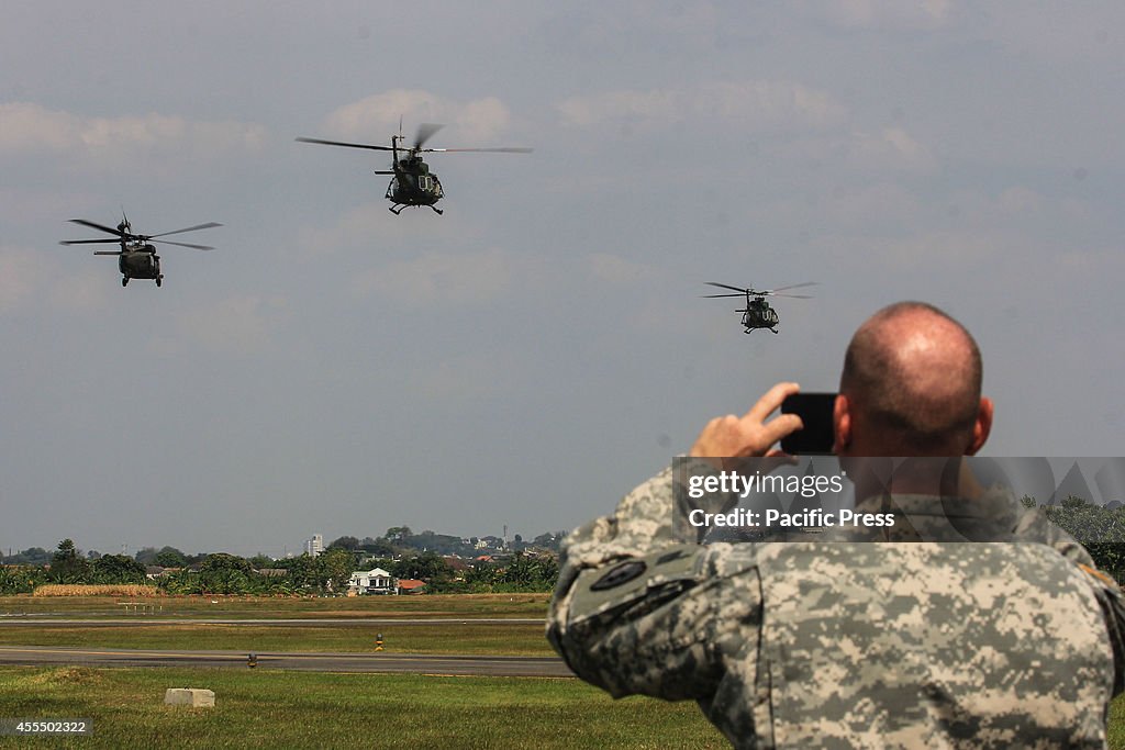 Military helicopters take part during the 8th Joint Exercise...