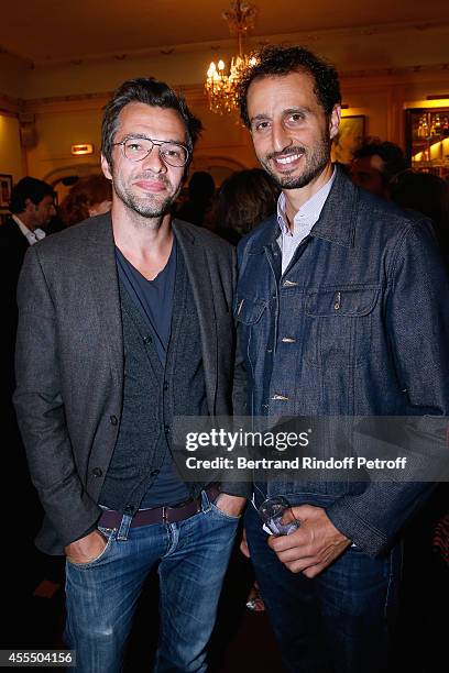 Jean-Marc Couderc and Arie Elmaleh pose after 'Un diner d'adieu' : Premiere. Held at Theatre Edouard VII on September 15, 2014 in Paris, France.