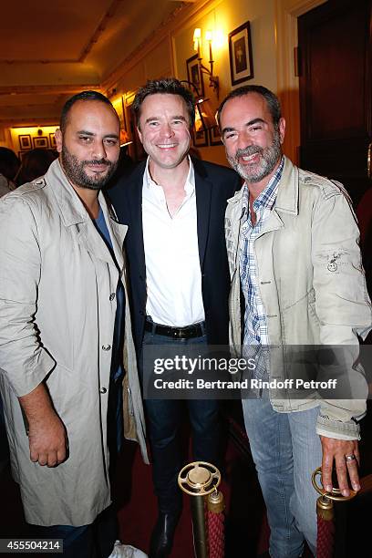 Actor of the piece Guillaume de Tonquedec standing between actor Bruno Solo and humorist Jerome Commandeur pose after 'Un diner d'adieu' : Premiere....