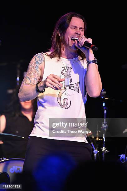 Myles Kennedy performs onstage with Slash and The Conspirators during a private concert for SiriusXM listeners at Santos Party House in New York City...