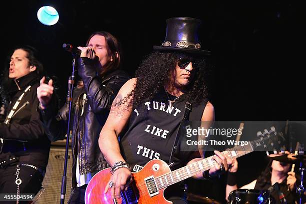 Myles Kennedy and Slash perform onstage with The Conspirators during a private concert for SiriusXM listeners at Santos Party House in New York City...