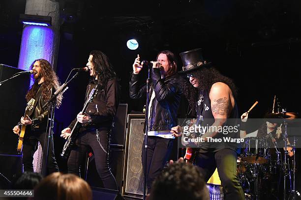 Slash and his band featuring Myles Kennedy and The Conspirators perform a private concert for SiriusXM listeners at Santos Party House in New York...