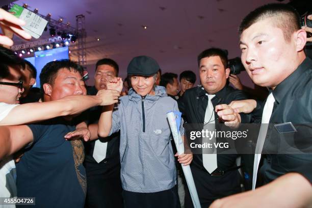 Actor/Director Stephen Chow attends heroine tryout of his new movie on September 15, 2014 in Shenzhen, Guangdong province of China.