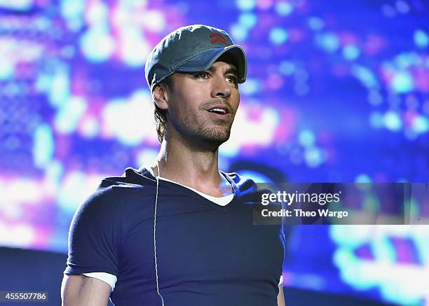 Enrique Iglesias and Pitbull with special guest J Balvin perform at opening night of U.S. Tour at Prudential Center on September 12, 2014 in Newark,...