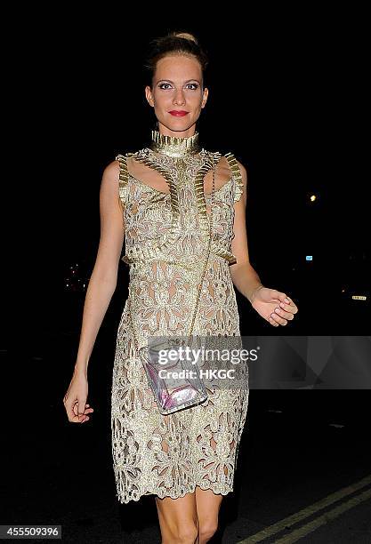 Poppy Delevingne arrives at Downing Street for Samantha Cameron's reception to celebrate London Fashion Week on September 15, 2014 in London, England.