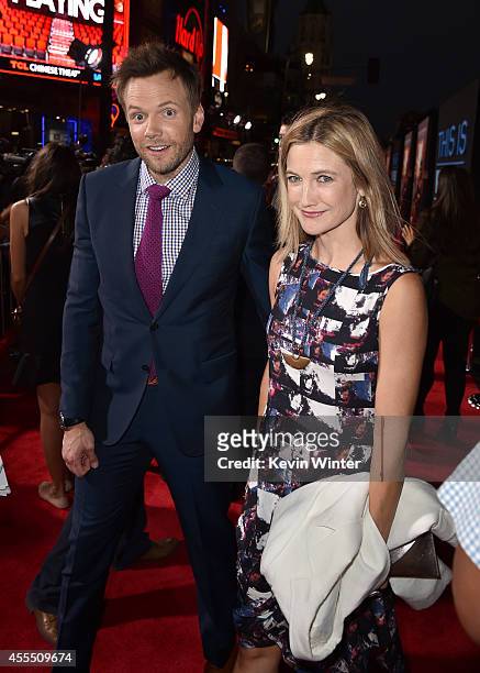 Actor Joel McHale and Sarah Williams arrive at the premiere of Warner Bros. Pictures' "This Is Where I Leave You" at TCL Chinese Theatre on September...