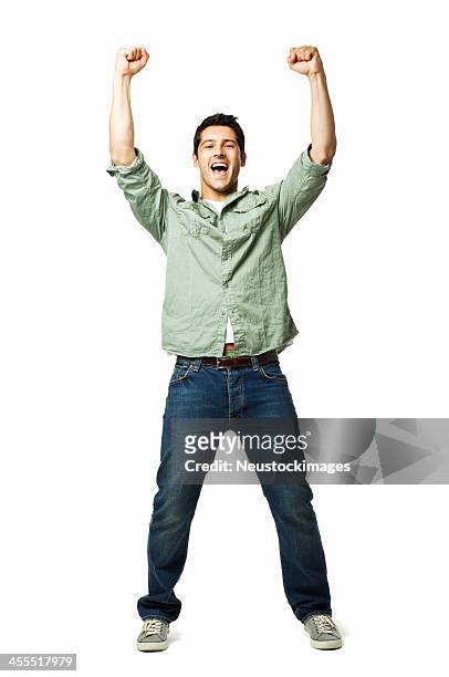 handsome young man cheering - isolated - armen omhoog stockfoto's en -beelden