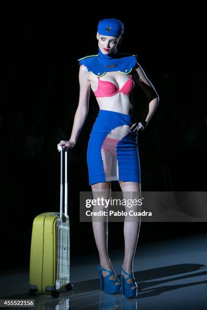 Model showcases designs by Andres Sarda on the runway during the Mercedes-Benz Fashion Week Madrid Spring/Summer 2015 at Ifema on September 15, 2014...