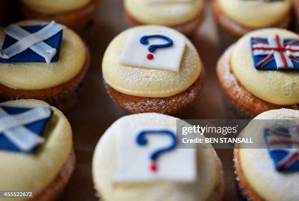 Referendum cupcakes' featuring a Scottish Saltire, a Union flag and a question mark symbolising the 'undecided voter' are pictured in a bakery in...