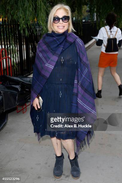 Brix Smith seen arriving at St Andrew Holbron for the Simone Rocha show on September 16, 2014 in London, England. Photo by Alex Huckle/GC Images)