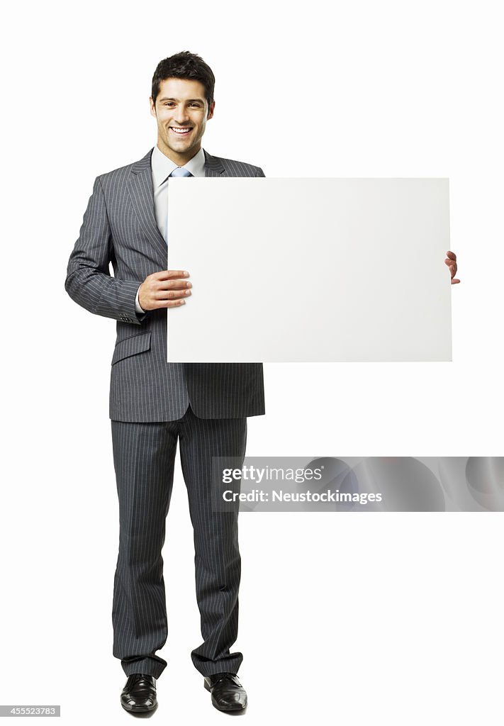 Businessman Holding a Blank Sign - Isolated