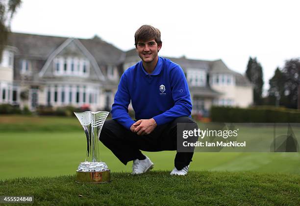 Local golfer and Junior Ryder Cup team member Bradley Neil posses with the trophy prior to next weeks competition at Blairgowrie Golf Course on...