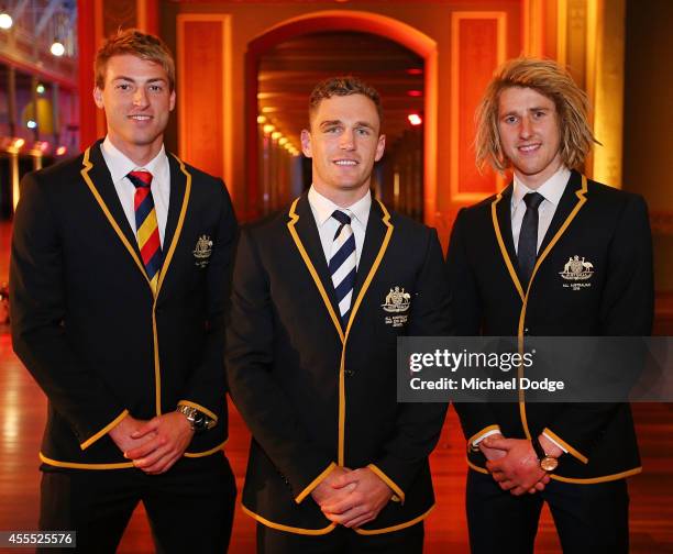 All Australian Team members Daniel Talia of the Crows Joel Selwood of the Cats and Dyson Heppell of the Bombers pose for the All Australian Team...