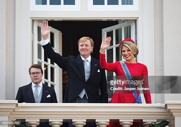 King Willem-Alexander and Queen Maxima of the Netherlands wave from the Noordeinde palace balcony on September 16, 2014 in The Hague, Netherlands....